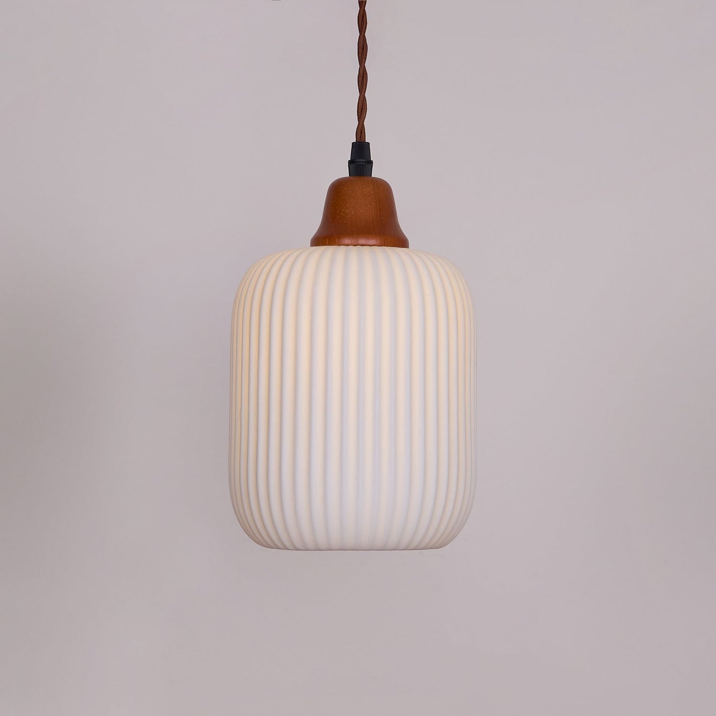 Ceramic Pendant Light with Ribbed Design and Wooden Details for Atmospheric Lighting