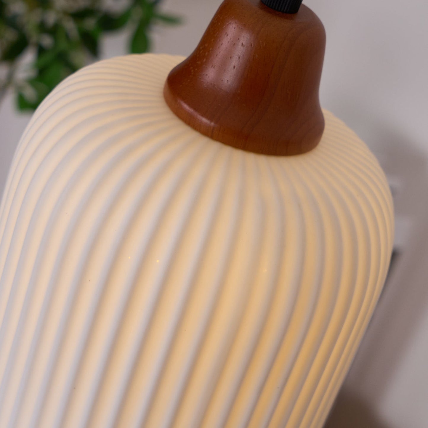 Ceramic Pendant Light with Ribbed Design and Wooden Details for Atmospheric Lighting