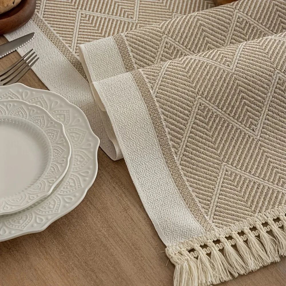 Table with Woven Runner with Zigzag Pattern and Fringes for Stylish Tables