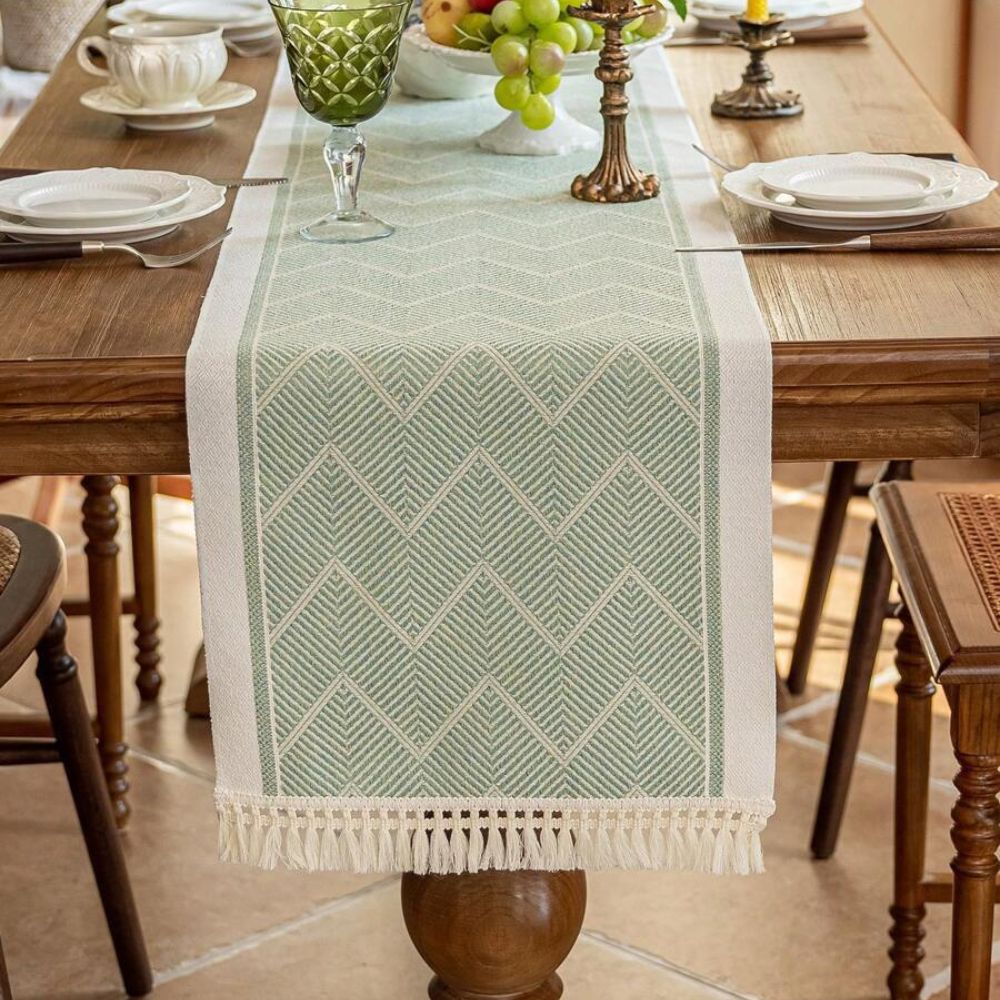 Table with Woven Runner with Zigzag Pattern and Fringes for Stylish Tables