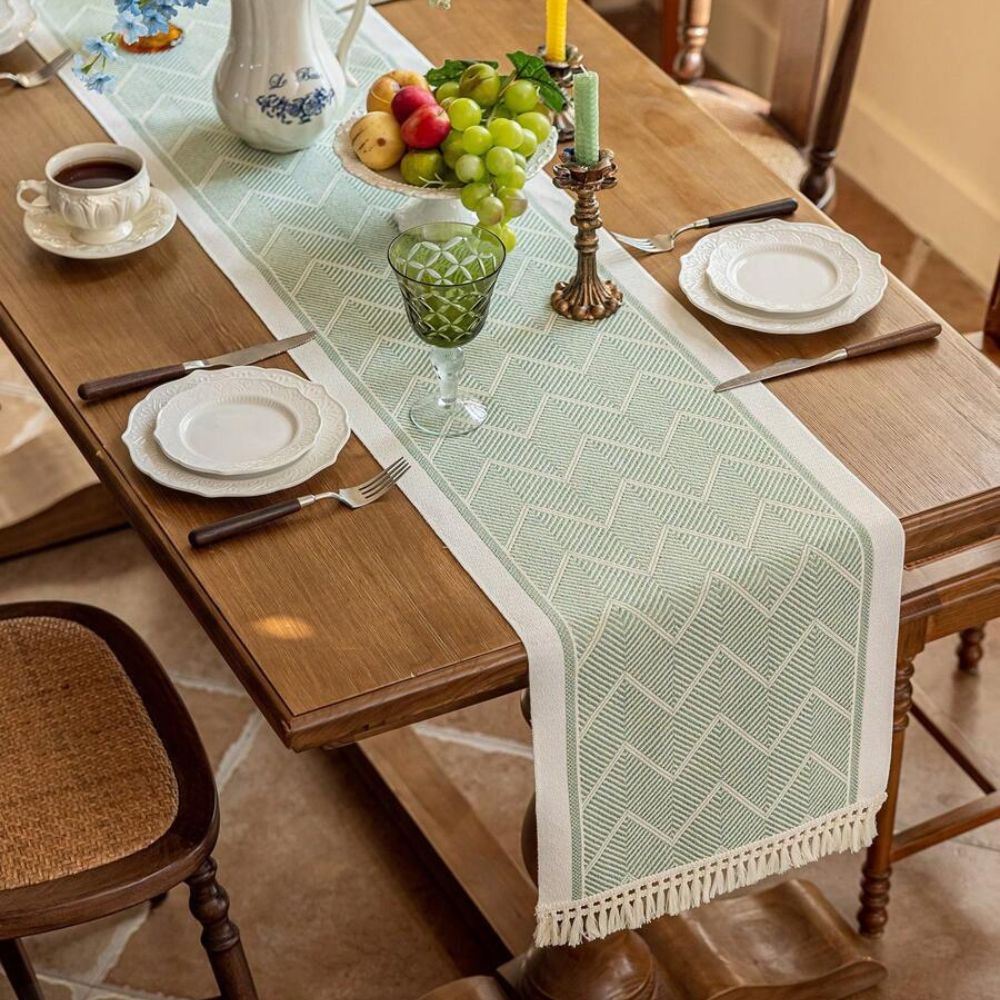 Table with Woven Runner with Zigzag Pattern and Fringes for Stylish Tables