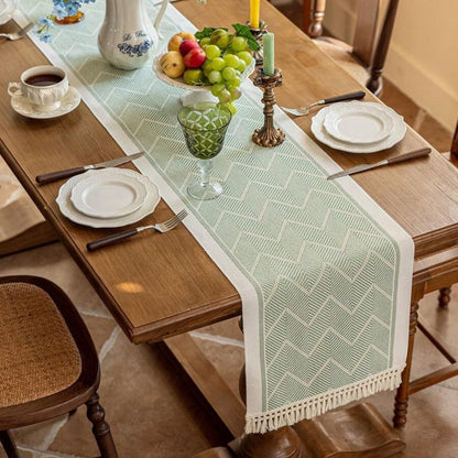 Table with Woven Runner with Zigzag Pattern and Fringes for Stylish Tables