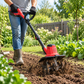Motobineuse sans fil en utilisation dans le jardin